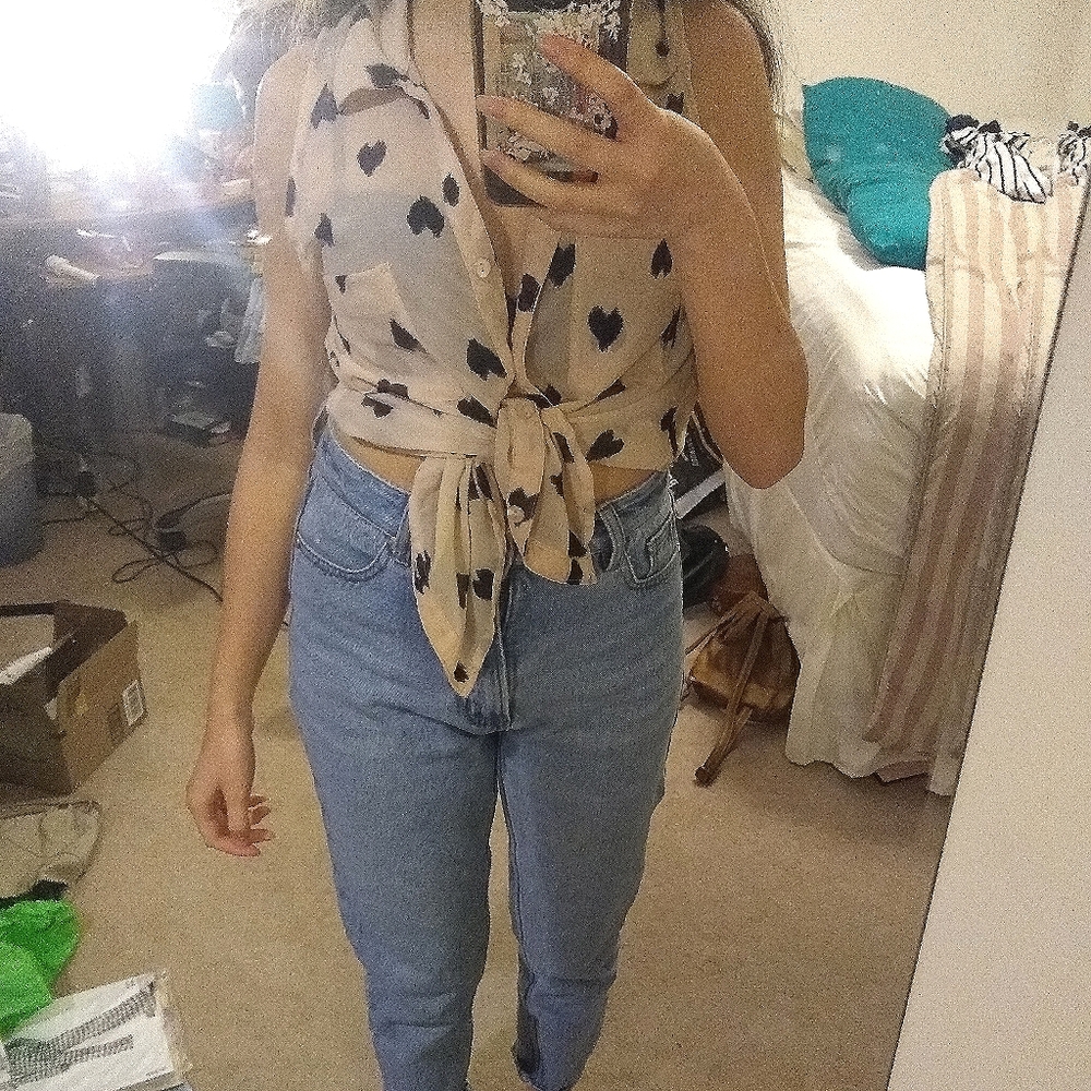 Sleeveless button down blouse